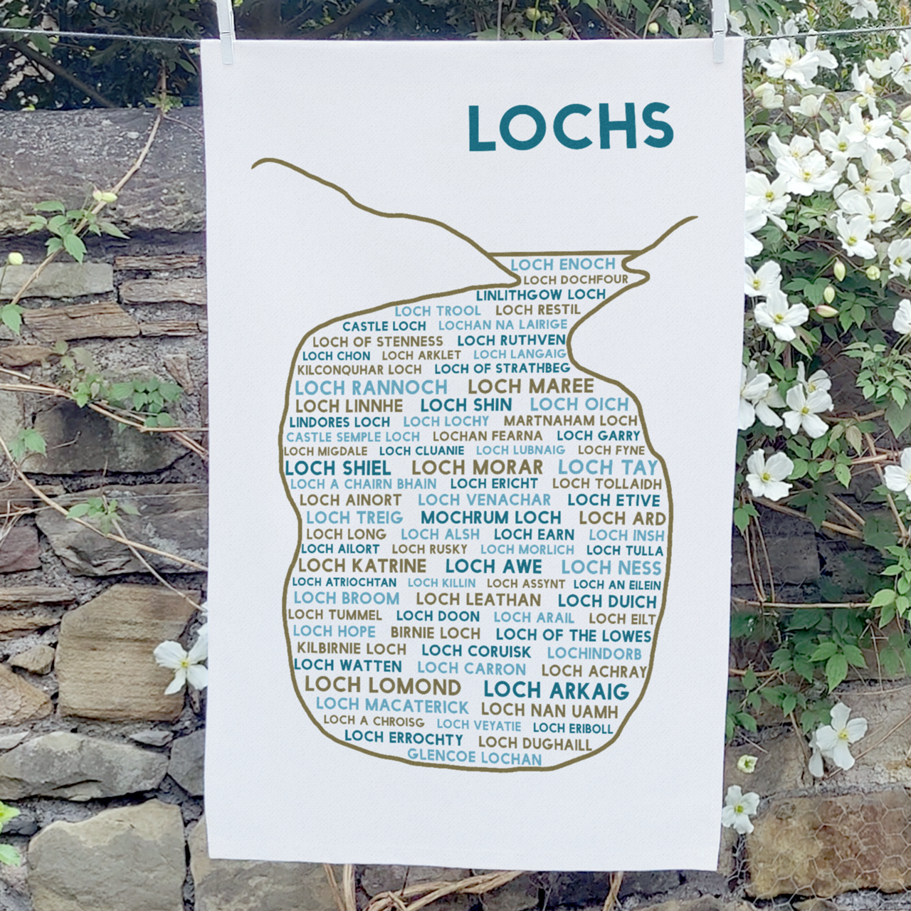 Lochs tea towel hanging on a washing line outdoors